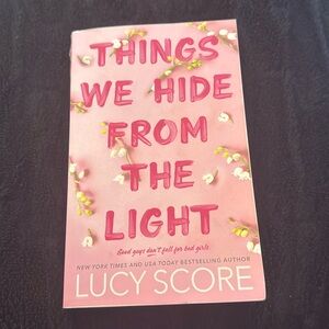 Book - things we hide from the light by Lucy Score